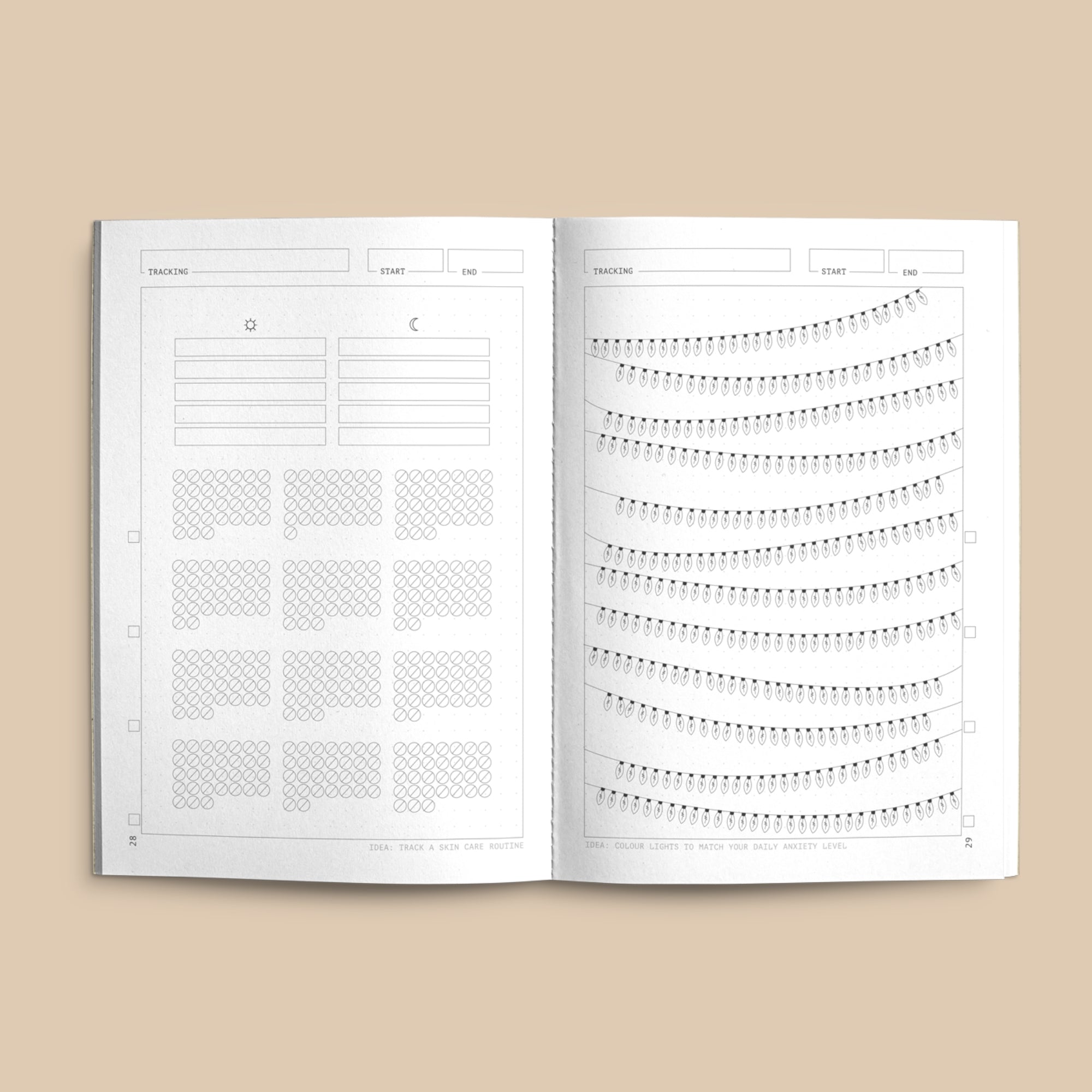 An open Creator's Friend notebook, showing two different project tracking layouts.  