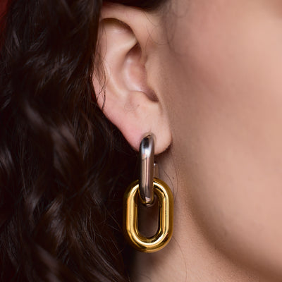 Close-up of an ear wearing a Claire Link earring by Peg's Hardware