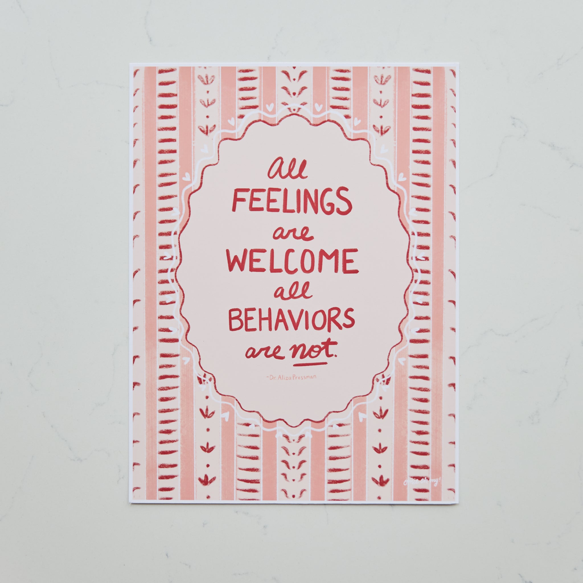 A square art print with a pink and white bohemian-style pattern, featuring the quote 'All Feelings are Welcome, all Behaviors are not.'