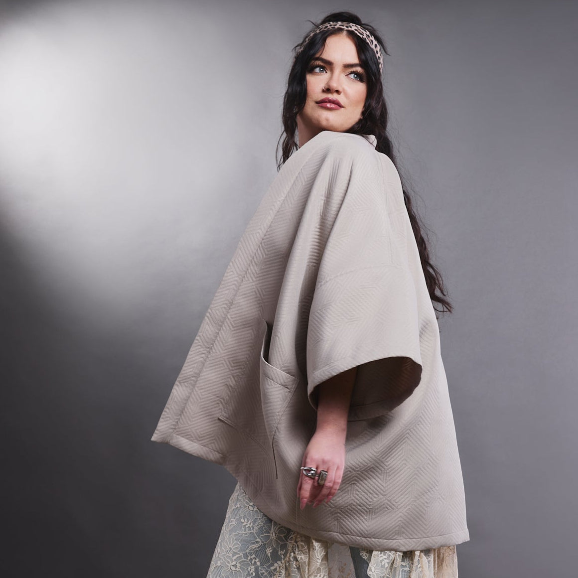 Woman wearing a beige ARW jacket