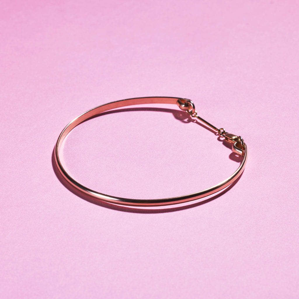 The gold version of Peg's Hardware's Peg's Bangle.