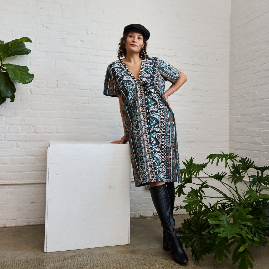 the pattern version of ARW's deep V block dress, being worn on a model.