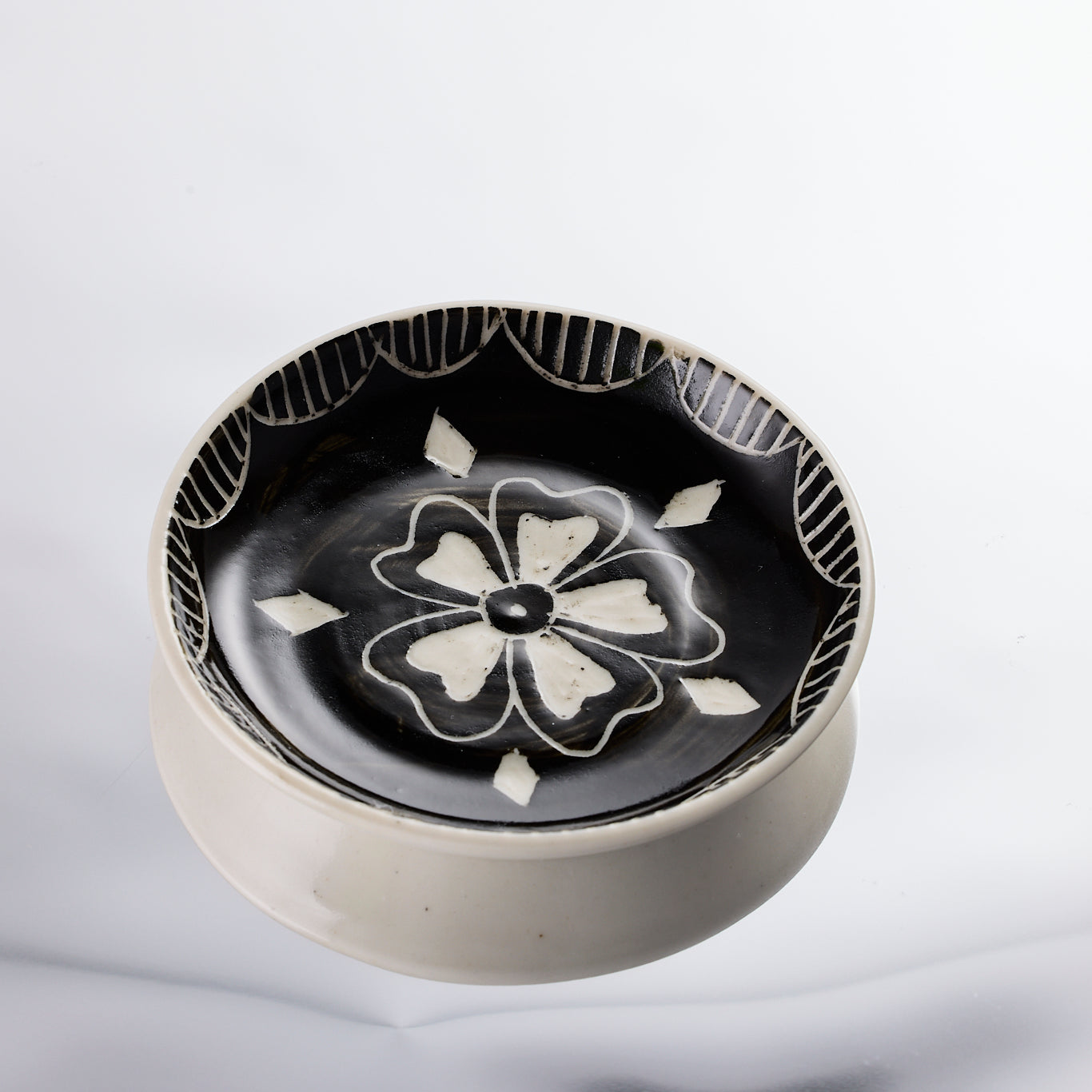 handmade porcelain dish with flower design
