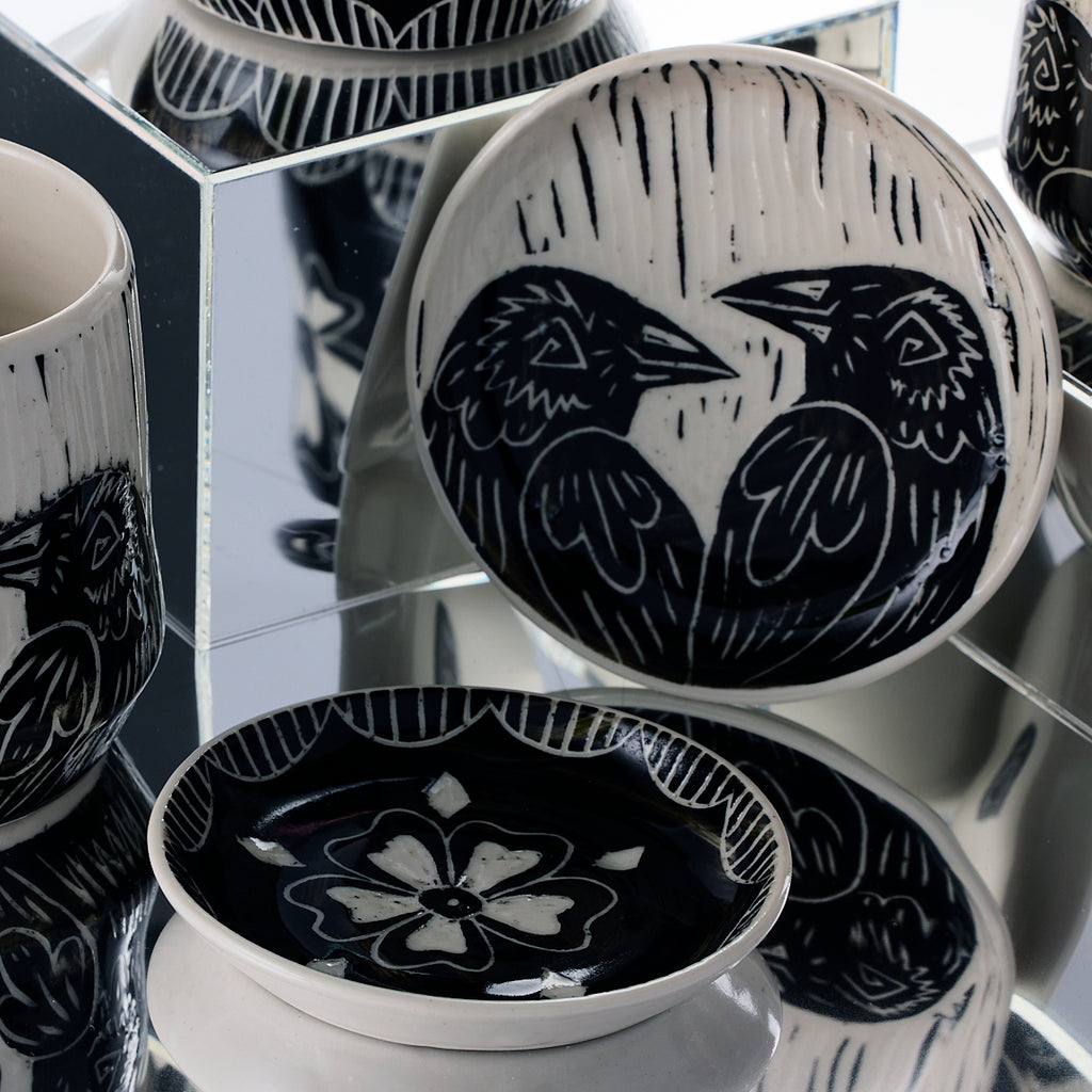 handmade porcelain dish with raven and flower design