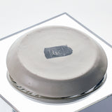 Artist signature on the bottom of porcelain dish