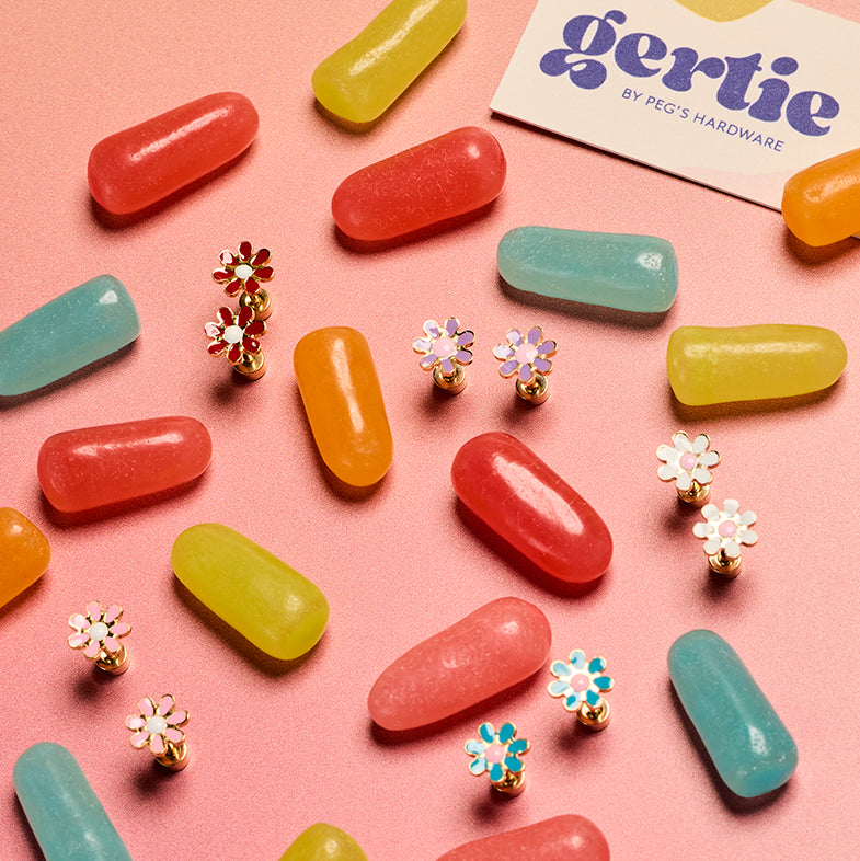 gertie by pegs hardware daisy stud flat back earrings in four colors