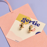 gertie by peg's hardware gem huggies tucked into soft pink earring pouch