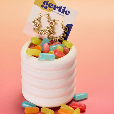 muse hoops from Gertie by Peg's Hardware. Gold hoops with colorful gems in candy