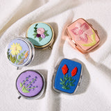 hand-embroidered pill cases