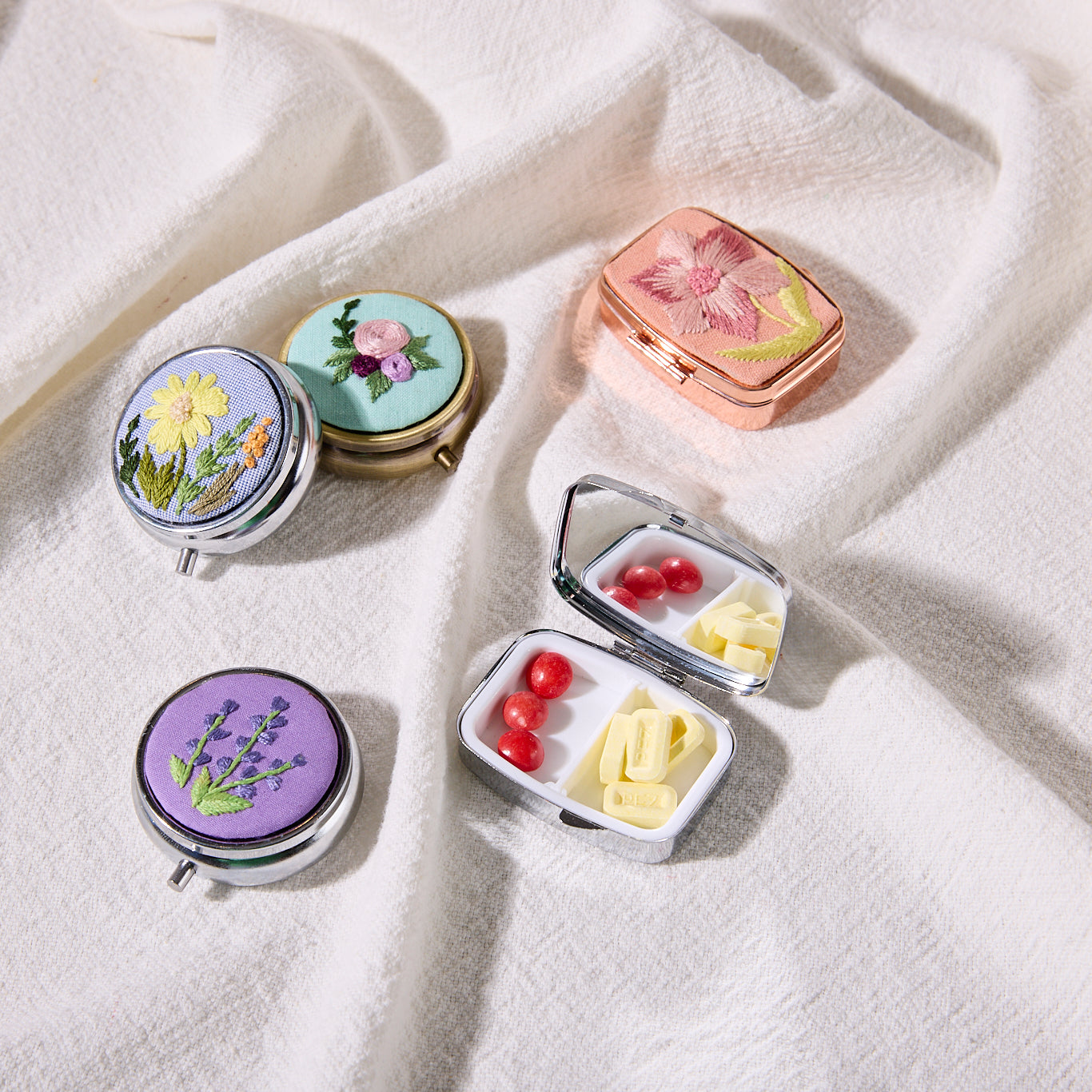 hand-embroidered pill case