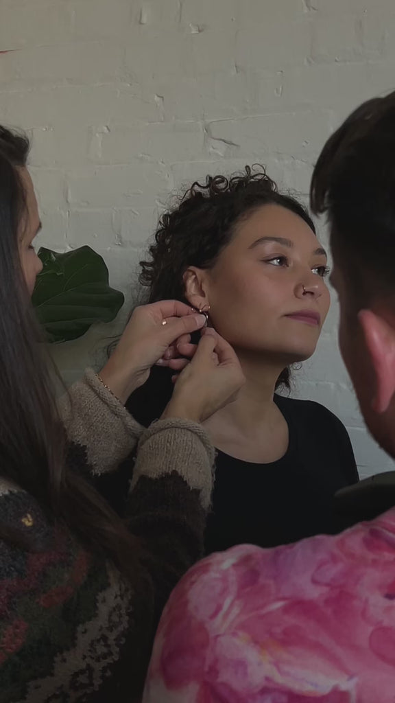 Video of various Peg's Hardware jewelry on models.